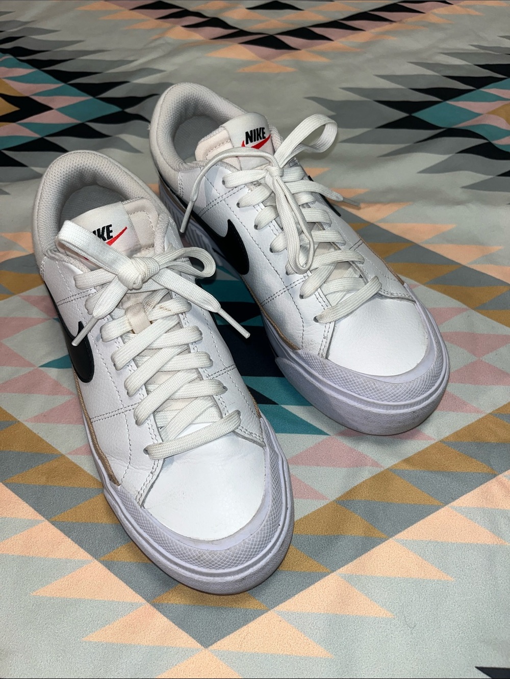 Nike White Leather Low-Top Sneakers with Black Swoosh
